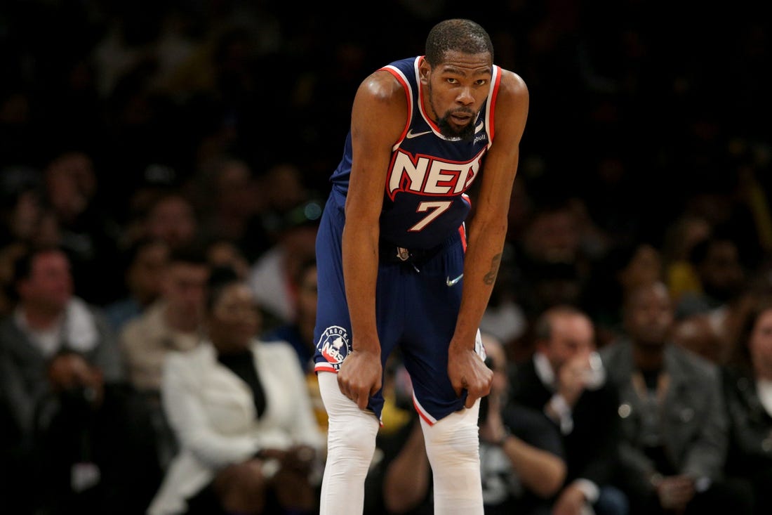 Apr 25, 2022; Brooklyn, New York, USA; Brooklyn Nets forward Kevin Durant (7) reacts during the second quarter of game four of the first round of the 2022 NBA playoffs against the Boston Celtics at Barclays Center. Mandatory Credit: Brad Penner-USA TODAY Sports