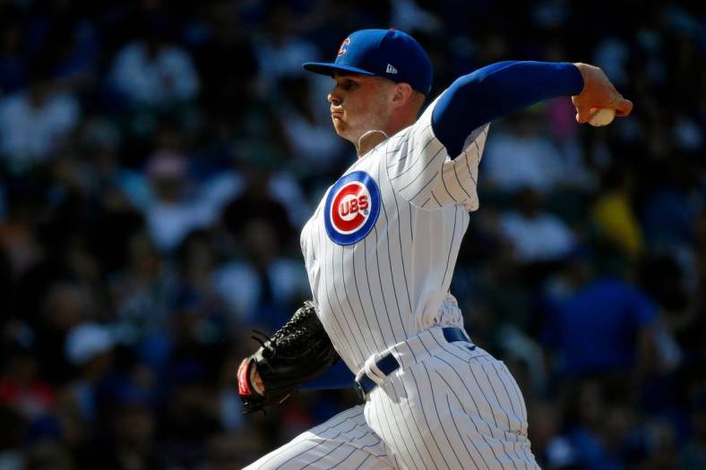 Apr 23, 2022; Chicago, Illinois, USA; Chicago Cubs relief pitcher Sean Newcomb (15) pitches against the Pittsburgh Pirates during the eighth inning at Wrigley Field. Mandatory Credit: Jon Durr-USA TODAY Sports