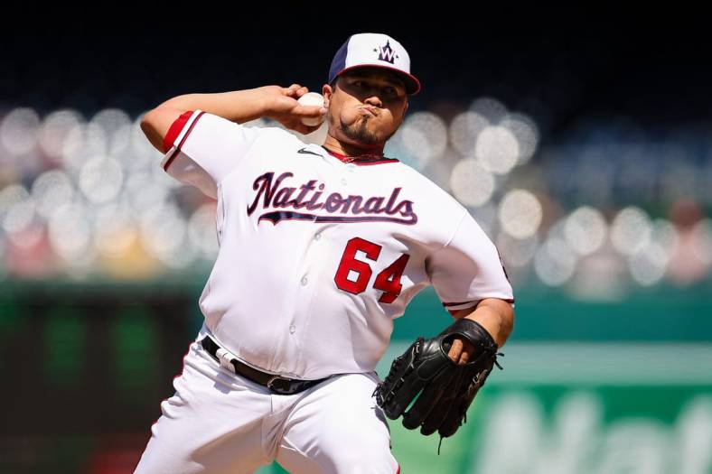 Apr 28, 2022; Washington, District of Columbia, USA; Washington Nationals relief pitcher Victor Arano (64) pitches against the Miami Marlins during the seventh inning at Nationals Park. Mandatory Credit: Scott Taetsch-USA TODAY Sports