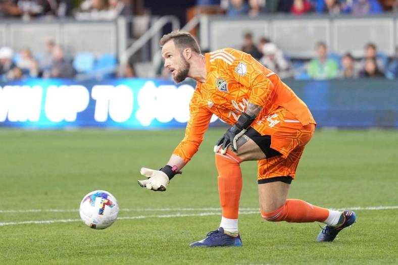 Apr 23, 2022; San Jose, California, USA; Seattle Sounders goalkeeper Stefan Frei (24) passes during the first half against the San Jose Earthquakes at PayPal Park. Mandatory Credit: Darren Yamashita-USA TODAY Sports
