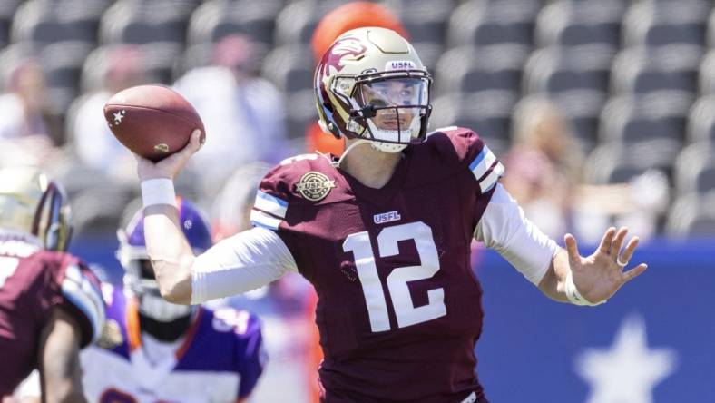 May 1, 2022; Birmingham, AL, USA; Michigan Panthers quarterback Paxton Lynch (12) throws against the Pittsburgh Maulers during the first half at Protective Stadium. Mandatory Credit: Vasha Hunt-USA TODAY Sports