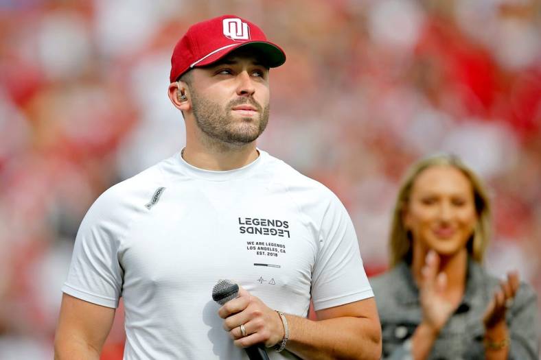 Former OU quarterback Baker Mayfield speaks to the crowd at Owen Field on April 23 in Norman.cover small