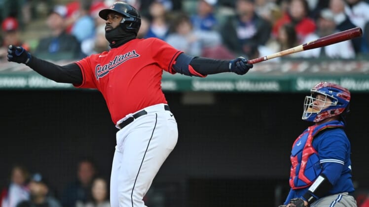 May 7, 2022; Cleveland, Ohio, USA; Cleveland Guardians right fielder Franmil Reyes (32) hits a home run during the third inning against the Toronto Blue Jays at Progressive Field. Mandatory Credit: Ken Blaze-USA TODAY Sports