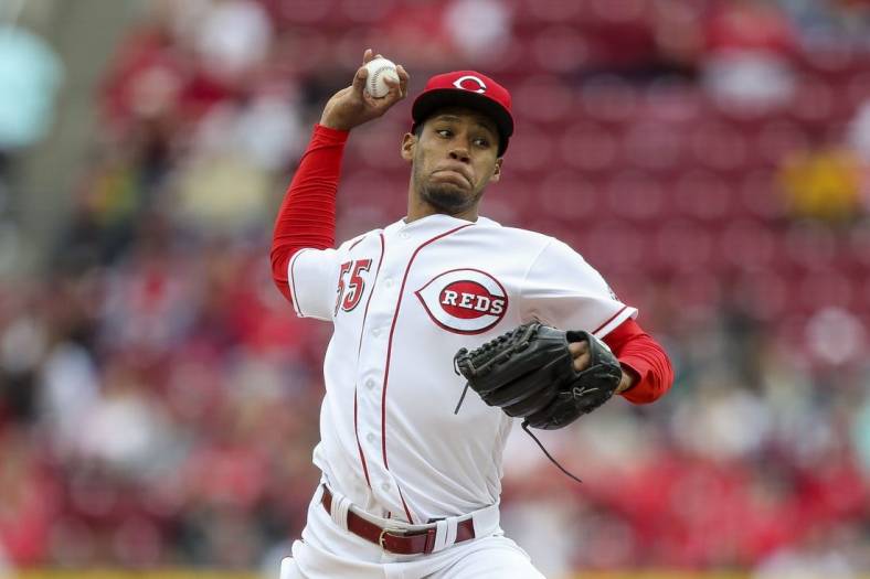 May 7, 2022; Cincinnati, Ohio, USA; Cincinnati Reds pitcher Dauri Moreta (55) throws against the Pittsburgh Pirates in the first inning at Great American Ball Park. Mandatory Credit: Katie Stratman-USA TODAY Sports