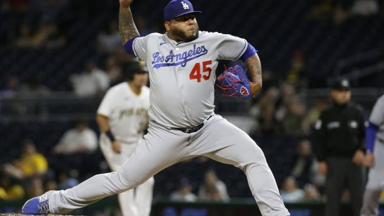 May 10, 2022; Pittsburgh, Pennsylvania, USA;  Los Angeles Dodgers relief pitcher Reyes Moronta (45) pitches against the Pittsburgh Pirates during the eighth inning at PNC Park. The Dodgers won 11-1. Mandatory Credit: Charles LeClaire-USA TODAY Sports