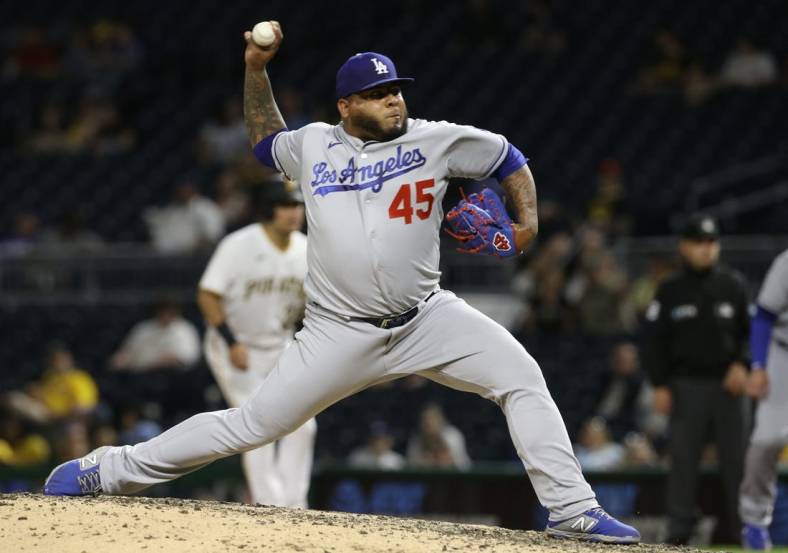 May 10, 2022; Pittsburgh, Pennsylvania, USA;  Los Angeles Dodgers relief pitcher Reyes Moronta (45) pitches against the Pittsburgh Pirates during the eighth inning at PNC Park. The Dodgers won 11-1. Mandatory Credit: Charles LeClaire-USA TODAY Sports