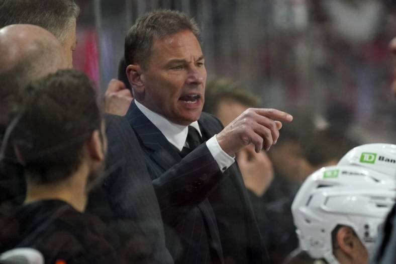 May 10, 2022; Raleigh, North Carolina, USA; Boston Bruins head coach Bruce Cassidy reacts against the Carolina Hurricanes during the third period in game five of the first round of the 2022 Stanley Cup Playoffs at PNC Arena. Mandatory Credit: James Guillory-USA TODAY Sports