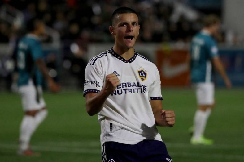 May 11, 2022; Irvine, California, USA;  Los Angeles Galaxy forward Dejan Joveljic (99) reacts after scoring a penalty kick against the California United Strikers FC during the second half at Championship Soccer Stadium. Mandatory Credit: Kiyoshi Mio-USA TODAY Sports