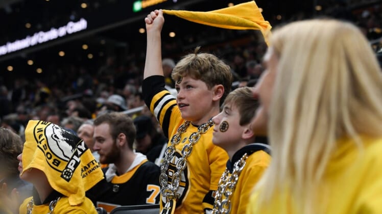 May 12, 2022; Boston, Massachusetts, USA; A Boston Bruins fan cheers during a game against the Carolina Hurricanes during the first period at the TD Garden. Mandatory Credit: Brian Fluharty-USA TODAY Sports