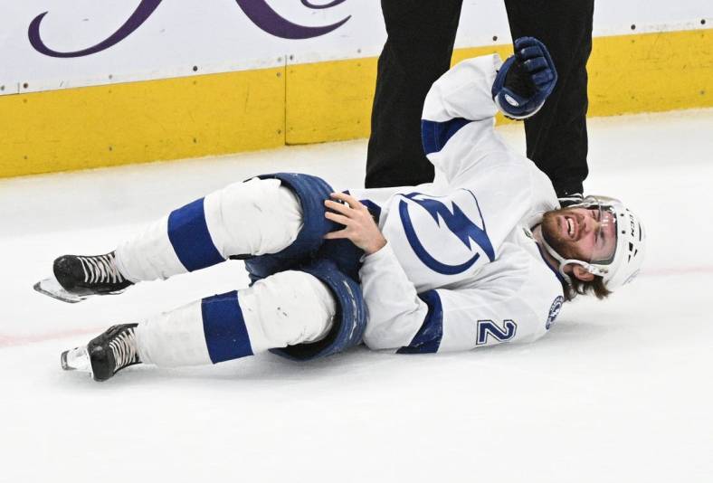 May 14, 2022; Toronto, Ontario, CAN; Tampa Bay Lightning forward Brayden Point (21) reacts after suffering an apparent injuryagainst the Toronto Maple Leafs in game seven of the first round of the 2022 Stanley Cup Playoffs at Scotiabank Arena. Mandatory Credit: Dan Hamilton-USA TODAY Sports