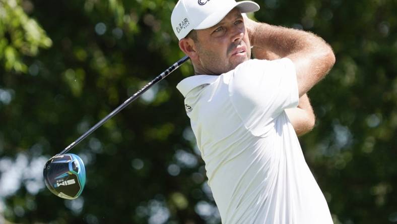 May 15, 2022; McKinney, Texas, USA; Charl Schwartzel plays his shot from the second tee during the final round of the AT&T Byron Nelson golf tournament. Mandatory Credit: Raymond Carlin III-USA TODAY Sports