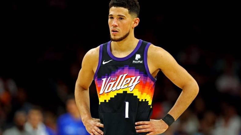 May 15, 2022; Phoenix, Arizona, USA; Phoenix Suns guard Devin Booker (1) reacts during the fourth quarter against the Dallas Mavericks in game seven of the second round for the 2022 NBA playoffs at Footprint Center. Mandatory Credit: Mark J. Rebilas-USA TODAY Sports