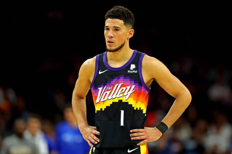 May 15, 2022; Phoenix, Arizona, USA; Phoenix Suns guard Devin Booker (1) reacts during the fourth quarter against the Dallas Mavericks in game seven of the second round for the 2022 NBA playoffs at Footprint Center. Mandatory Credit: Mark J. Rebilas-USA TODAY Sports