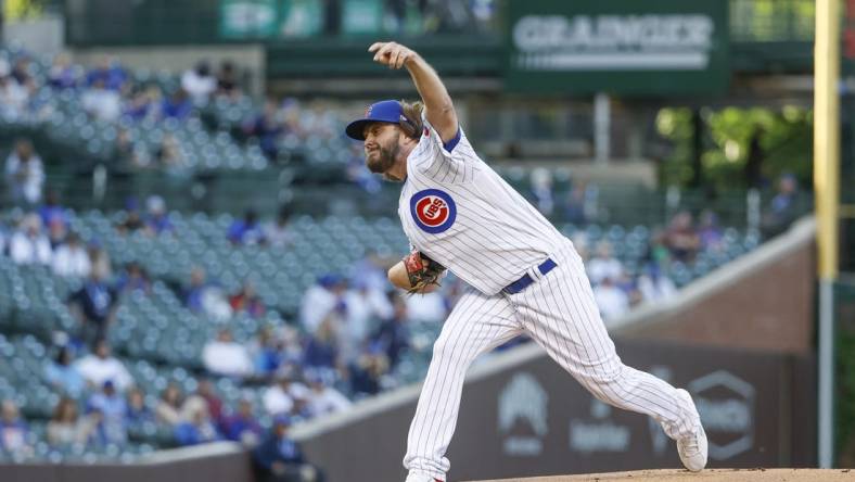 May 16, 2022; Chicago, Illinois, USA; Chicago Cubs starting pitcher Wade Miley (20) delivers against the Pittsburgh Pirates during the first inning at Wrigley Field. Mandatory Credit: Kamil Krzaczynski-USA TODAY Sports