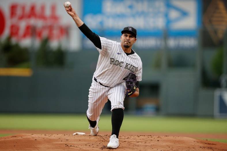 May 16, 2022; Denver, Colorado, USA; Colorado Rockies starting pitcher Antonio Senzatela (49) pitches in the first inning against the San Francisco Giants at Coors Field. Mandatory Credit: Isaiah J. Downing-USA TODAY Sports