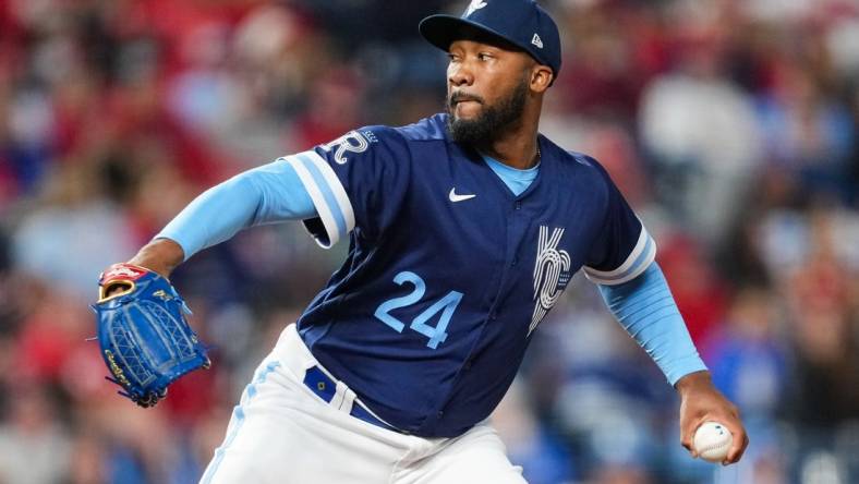 May 3, 2022; Kansas City, Missouri, USA; Kansas City Royals relief pitcher Amir Garrett (24) pitches against the St. Louis Cardinals during the eighth inning at Kauffman Stadium. Mandatory Credit: Jay Biggerstaff-USA TODAY Sports