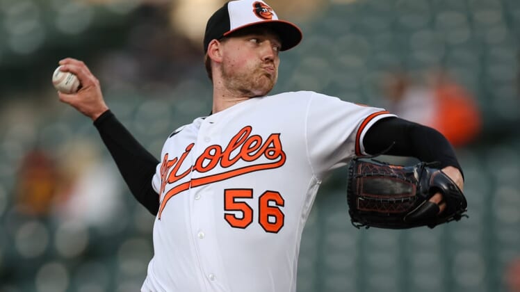 May 4, 2022; Baltimore, Maryland, USA; Baltimore Orioles starting pitcher Kyle Bradish (56) pitches against the Minnesota Twins during the first inning at Oriole Park at Camden Yards. Mandatory Credit: Scott Taetsch-USA TODAY Sports