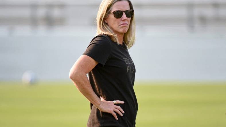 May 18, 2022; Cary, North Carolina, USA; Orlando Pride head coach Amanda Cromwell watches warmups before the game against the North Carolina Courage at WakeMed Soccer Park. Mandatory Credit: Rob Kinnan-USA TODAY Sports