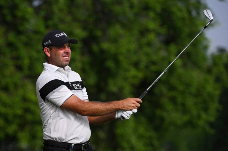 May 20, 2022; Tulsa, OK, USA; Charl Schwartzel plays his shot from the 11th tee during the second round of the PGA Championship golf tournament at Southern Hills Country Club. Mandatory Credit: Orlando Ramirez-USA TODAY Sports