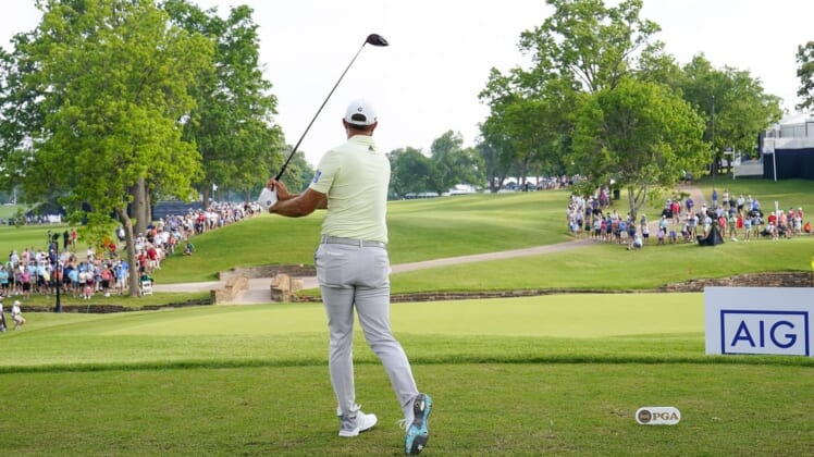May 20, 2022; Tulsa, OK, USA;  Dustin Johnson plays his shot from the 13th tee during the second round of the PGA Championship golf tournament at Southern Hills Country Club. Mandatory Credit: Michael Madrid-USA TODAY Sports
