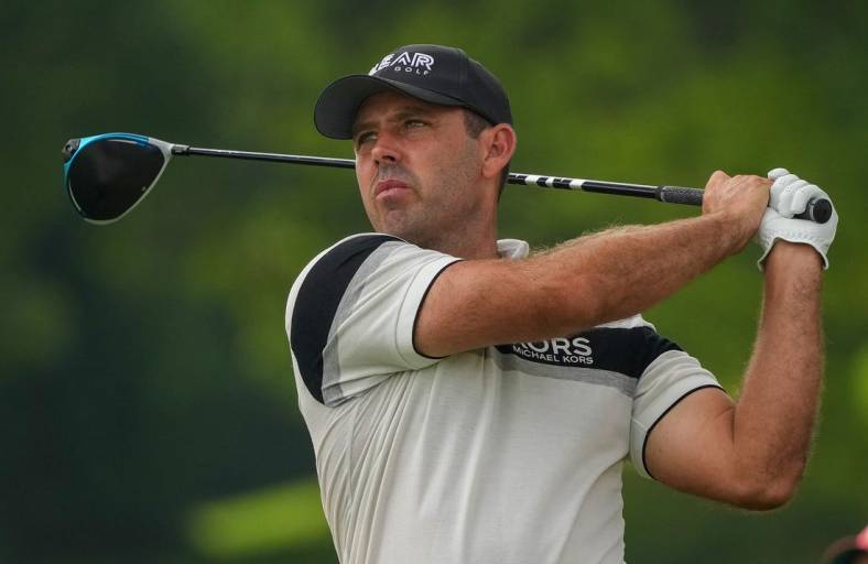 May 20, 2022; Tulsa, OK, USA; Charl Schwartzel plays his shot from the 13th tee during the second round of the PGA Championship golf tournament at Southern Hills Country Club. Mandatory Credit: Michael Madrid-USA TODAY Sports