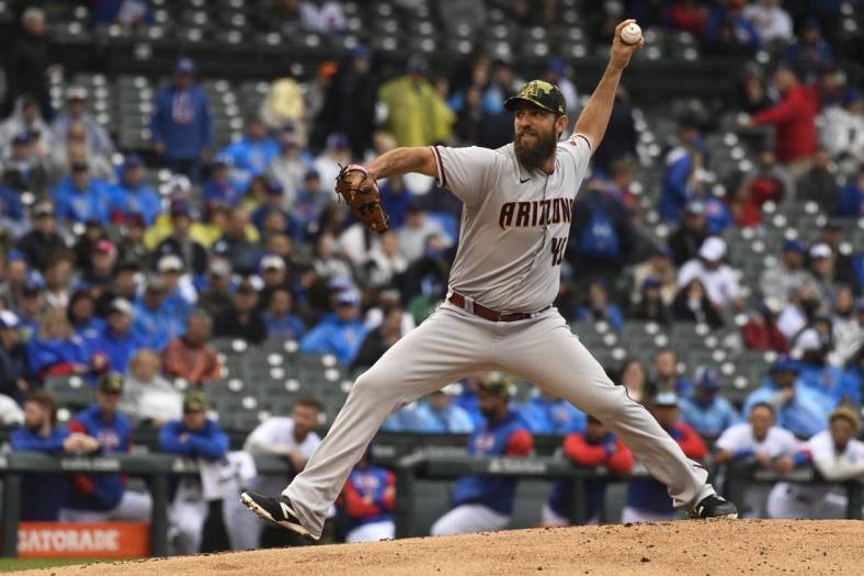 May 21, 2022; Chicago, Illinois, USA;  Arizona Diamondbacks starting pitcher Madison Bumgarner (40) delivers against the Chicago Cubs during the first inning at Wrigley Field. Mandatory Credit: Matt Marton-USA TODAY Sports