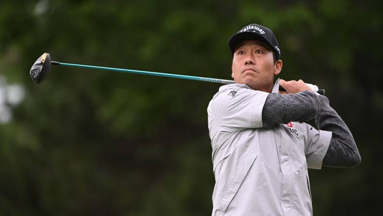 May 21, 2022; Tulsa, OK, USA;  Kevin Na hits his tee shot on the 7th hole during the third round of the PGA Championship golf tournament at Southern Hills Country Club. Mandatory Credit: Orlando Ramirez-USA TODAY Sports