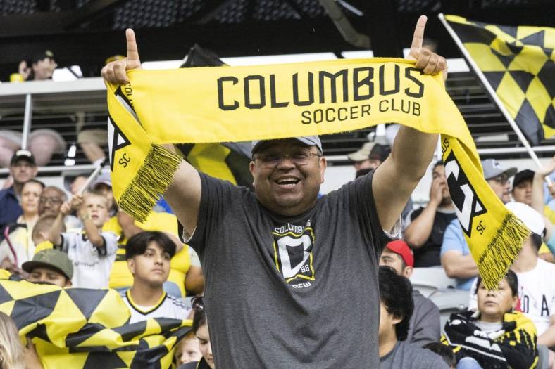 May 21, 2022; Columbus, Ohio, USA; A Columbus Crew fan celebrates supports his team prior to the match against Los Angeles FC at Lower.com. Field Mandatory Credit: Greg Bartram-USA TODAY Sports