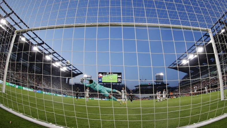 May 21, 2022; Washington, District of Columbia, USA; Toronto FC goalkeeper Alex Bono (25) makes a save against D.C. United in the second half at Audi Field. Mandatory Credit: Geoff Burke-USA TODAY Sports