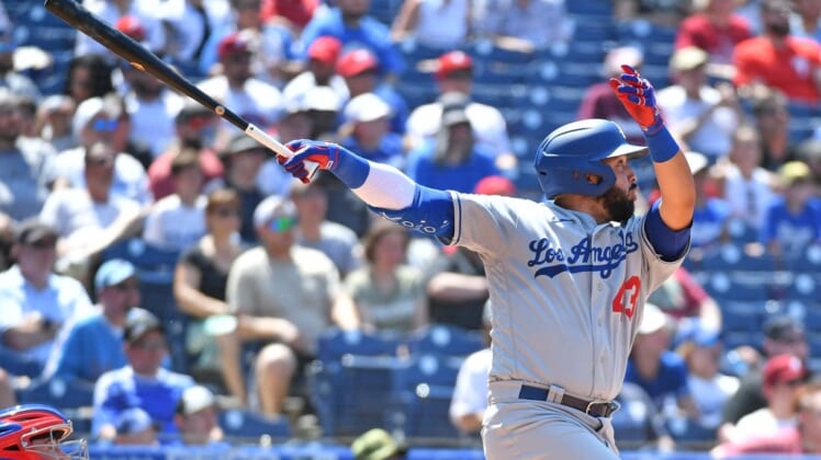Los Angeles Dodgers third baseman Edwin Rios watches his home run against the Philadelphia Phillies during the fourth inning at Citizens Bank Park.