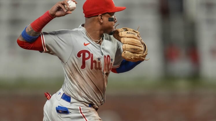 May 23, 2022; Cumberland, Georgia, USA; Philadelphia Phillies shortstop Johan Camargo (7) throws out Atlanta Braves left fielder William Contreras (24) (not shown) during the sixth inning at Truist Park. Mandatory Credit: Dale Zanine-USA TODAY Sports
