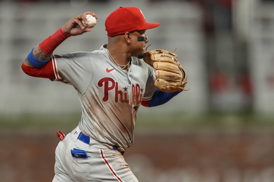 May 23, 2022; Cumberland, Georgia, USA; Philadelphia Phillies shortstop Johan Camargo (7) throws out Atlanta Braves left fielder William Contreras (24) (not shown) during the sixth inning at Truist Park. Mandatory Credit: Dale Zanine-USA TODAY Sports