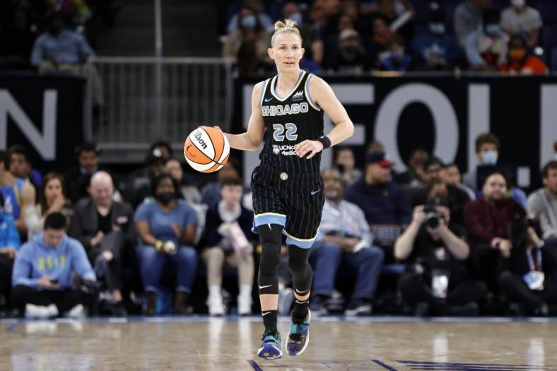 May 24, 2022; Chicago, Illinois, USA; Chicago Sky guard Courtney Vandersloot (22) brings the ball up court against the Indiana Fever during the first half at Wintrust Arena. Mandatory Credit: Kamil Krzaczynski-USA TODAY Sports