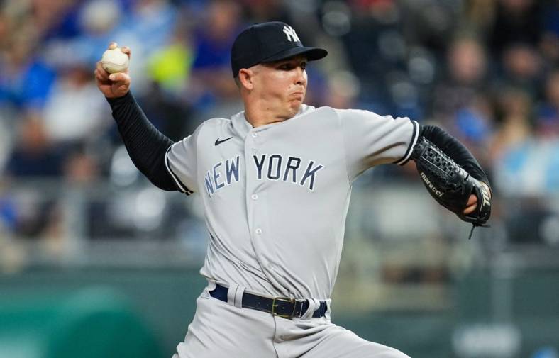 Apr 29, 2022; Kansas City, Missouri, USA; New York Yankees relief pitcher Chad Green (57) pitches against the Kansas City Royals during the seventh inning at Kauffman Stadium. Mandatory Credit: Jay Biggerstaff-USA TODAY Sports