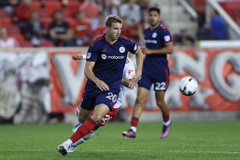 May 18, 2022; Harrison, New Jersey, USA; Chicago Fire defender Wyatt Omsberg (20) in action against the New York Red Bulls during the second half at Red Bull Arena. Mandatory Credit: Vincent Carchietta-USA TODAY Sports