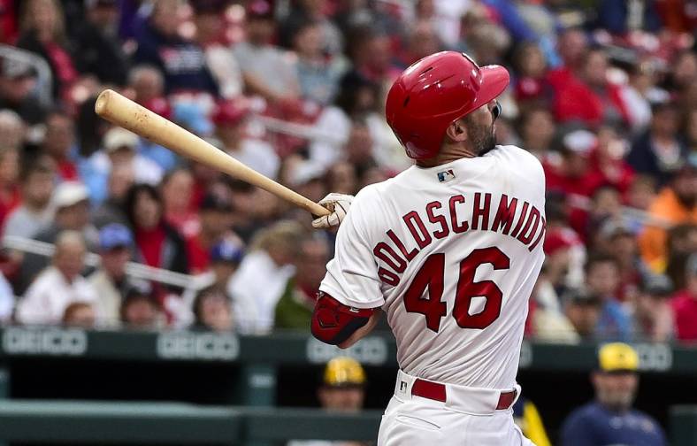 May 26, 2022; St. Louis, Missouri, USA;  St. Louis Cardinals first baseman Paul Goldschmidt (46) hits a single against the Milwaukee Brewers during the second inning at Busch Stadium. Mandatory Credit: Jeff Curry-USA TODAY Sports