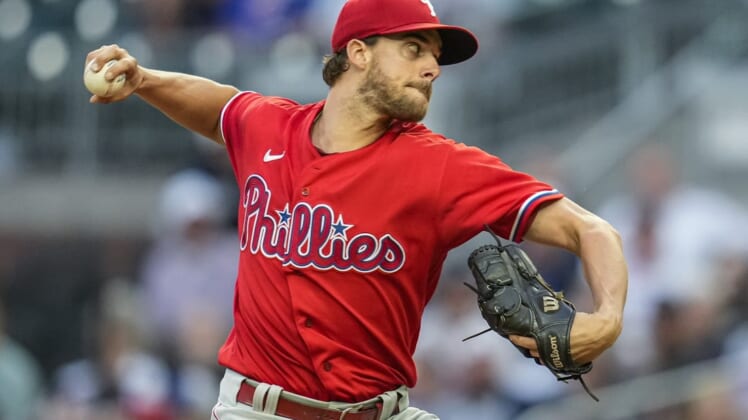 May 26, 2022; Cumberland, Georgia, USA; Philadelphia Phillies starting pitcher Aaron Nola (27) pitches against the Atlanta Braves during the first inning at Truist Park. Mandatory Credit: Dale Zanine-USA TODAY Sports
