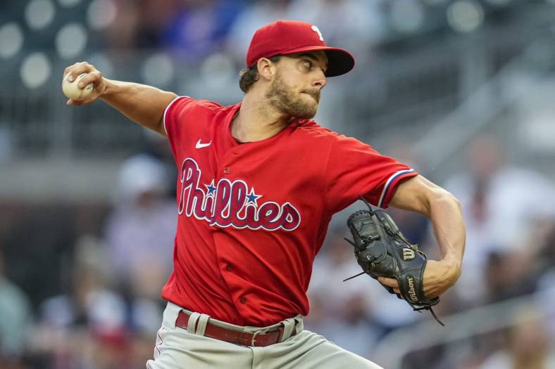 May 26, 2022; Cumberland, Georgia, USA; Philadelphia Phillies starting pitcher Aaron Nola (27) pitches against the Atlanta Braves during the first inning at Truist Park. Mandatory Credit: Dale Zanine-USA TODAY Sports