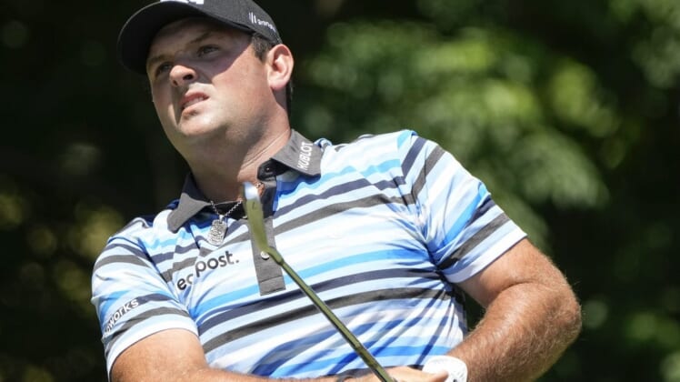 May 27, 2022; Fort Worth, Texas, USA; Patrick Reed plays his shot from the eighth tee during the second round of the Charles Schwab Challenge golf tournament. Mandatory Credit: Jim Cowsert-USA TODAY Sports