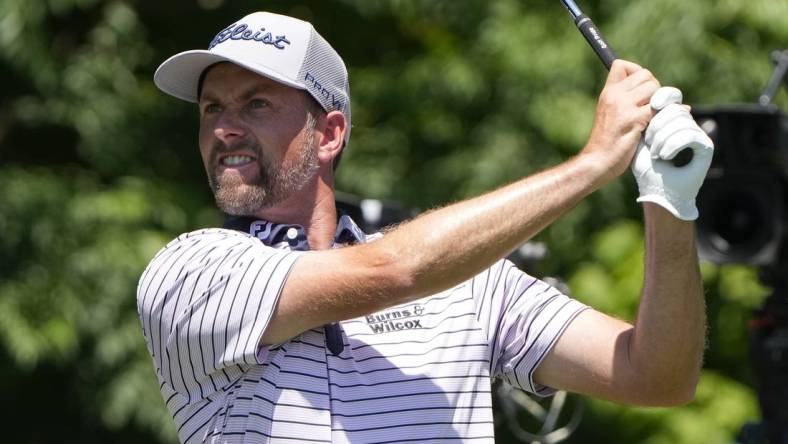 May 27, 2022; Fort Worth, Texas, USA; Webb Simpson plays his shot from the eighth tee during the second round of the Charles Schwab Challenge golf tournament. Mandatory Credit: Jim Cowsert-USA TODAY Sports