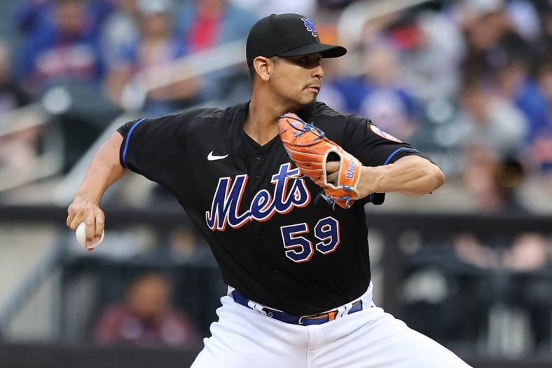 May 27, 2022; New York City, New York, USA; New York Mets starting pitcher Carlos Carrasco (59) delivers a pitch during the first inning against the Philadelphia Phillies at Citi Field. Mandatory Credit: Vincent Carchietta-USA TODAY Sports