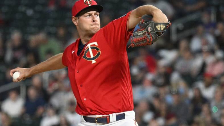 May 27, 2022; Minneapolis, Minnesota, USA; Minnesota Twins relief pitcher Trevor Megill (58) delivers a pitch against the Kansas City Royals during the fifth inning at Target Field. Mandatory Credit: Nick Wosika-USA TODAY Sports