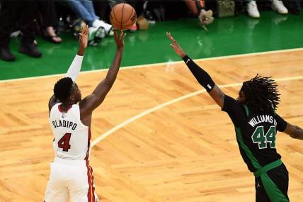 May 27, 2022; Boston, Massachusetts, USA; Miami Heat guard Victor Oladipo (4) shoots against Boston Celtics center Robert Williams III (44) during the second half in game six of the 2022 eastern conference finals at TD Garden. Mandatory Credit: Brian Fluharty-USA TODAY Sports