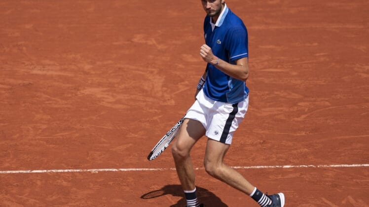 May 28, 2022; Paris, France; Daniil Medvedev reacts to a point  during his match against Miomir Kecmanovic (SRB) on day seven of the French Open at Stade Roland-Garros. Mandatory Credit: Susan Mullane-USA TODAY Sports