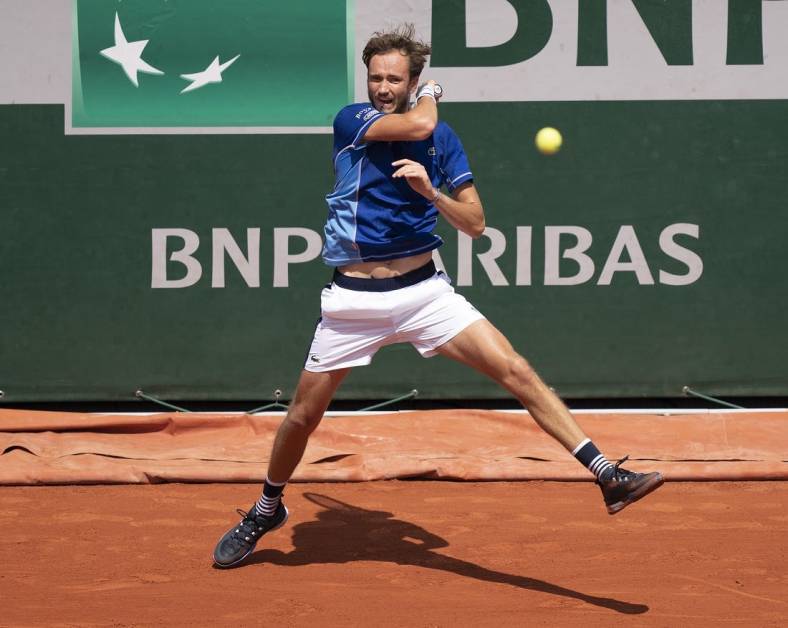 May 28, 2022; Paris, France; Daniil Medvedev returns a shot from Miomir Kecmanovic (SRB) during their match on day seven of the French Open at Stade Roland-Garros. Mandatory Credit: Susan Mullane-USA TODAY Sports