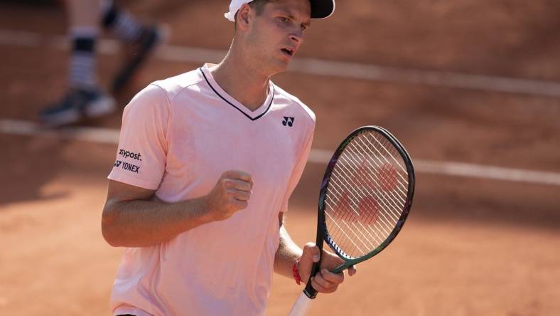 May 28, 2022; Paris, France; Hubert Hurkacz (POL) reacts to winning the second set in his match against David Goffin (BEL) on day seven of the French Open at Stade Roland-Garros. Mandatory Credit: Susan Mullane-USA TODAY Sports