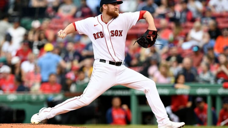 May 28, 2022; Boston, Massachusetts, USA; Boston Red Sox starting pitcher Josh Winckowski (73) pitches against the Baltimore Orioles during the first inning at Fenway Park. Mandatory Credit: Brian Fluharty-USA TODAY Sports