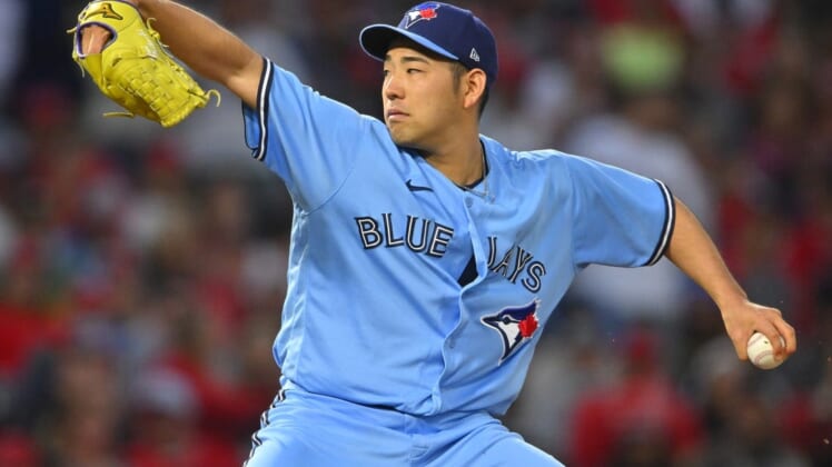 May 28, 2022; Anaheim, California, USA;  Toronto Blue Jays starting pitcher Yusei Kikuchi (16) throws in the second inning of the game against the Los Angeles Angels at Angel Stadium. Mandatory Credit: Jayne Kamin-Oncea-USA TODAY Sports