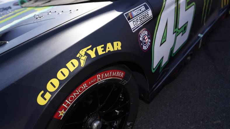 May 29, 2022; Concord, North Carolina, USA; A general view of the special Honor and Remember logo on the tire of the car of NASCAR Cup Series driver Kurt Busch (45) on pit road prior to the Coca-Cola 600 at Charlotte Motor Speedway. Mandatory Credit: Jasen Vinlove-USA TODAY Sports