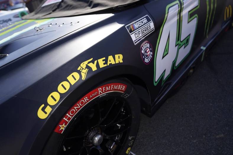 May 29, 2022; Concord, North Carolina, USA; A general view of the special Honor and Remember logo on the tire of the car of NASCAR Cup Series driver Kurt Busch (45) on pit road prior to the Coca-Cola 600 at Charlotte Motor Speedway. Mandatory Credit: Jasen Vinlove-USA TODAY Sports